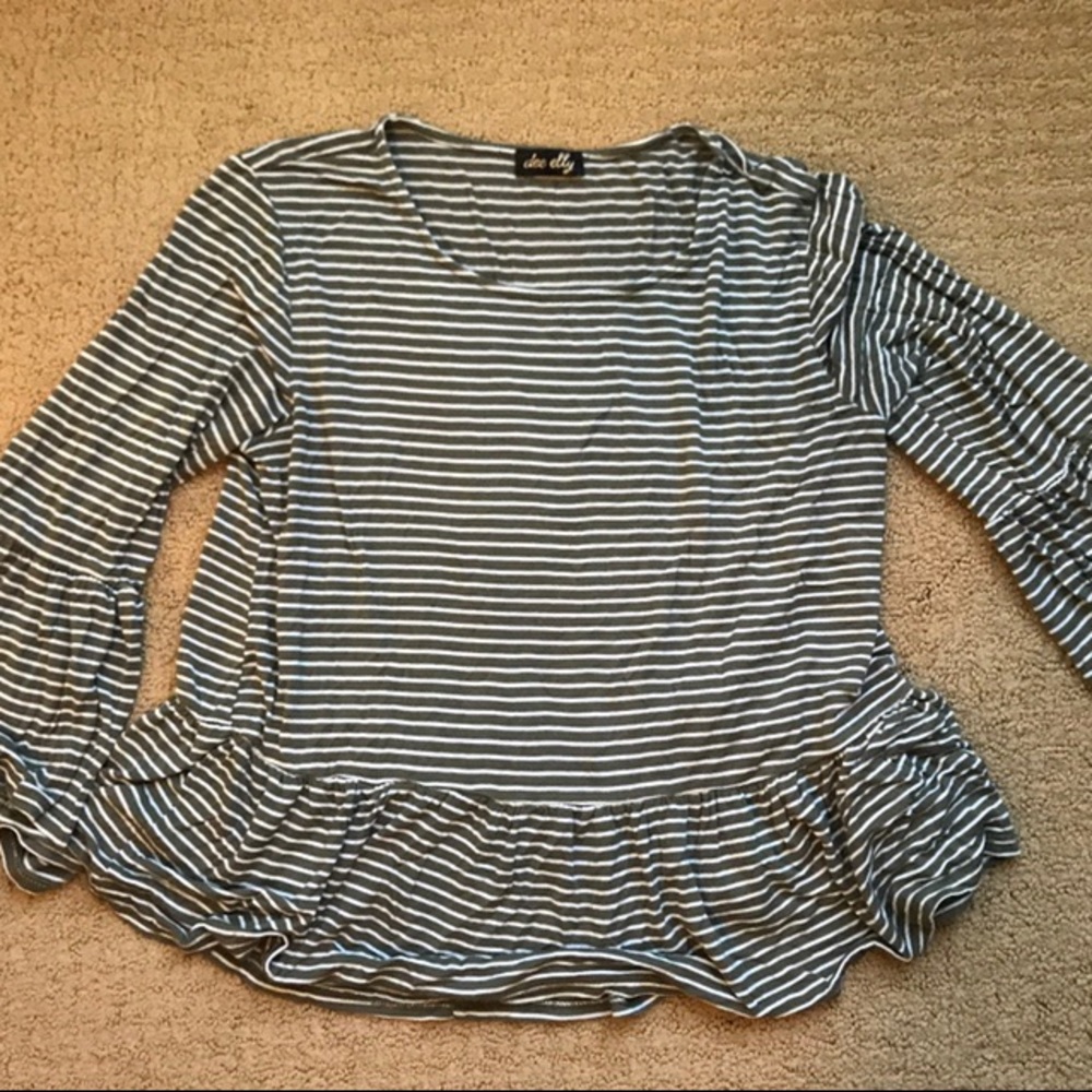 Francesca’s Three-Quarter Sleeve Peplum Top!